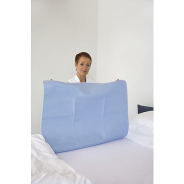 MoliCare Bed Mat Größe 85x90 cm - Detail der saugfähigen und flüssigkeitsdichten Schichten - Med-Praxisbedarf